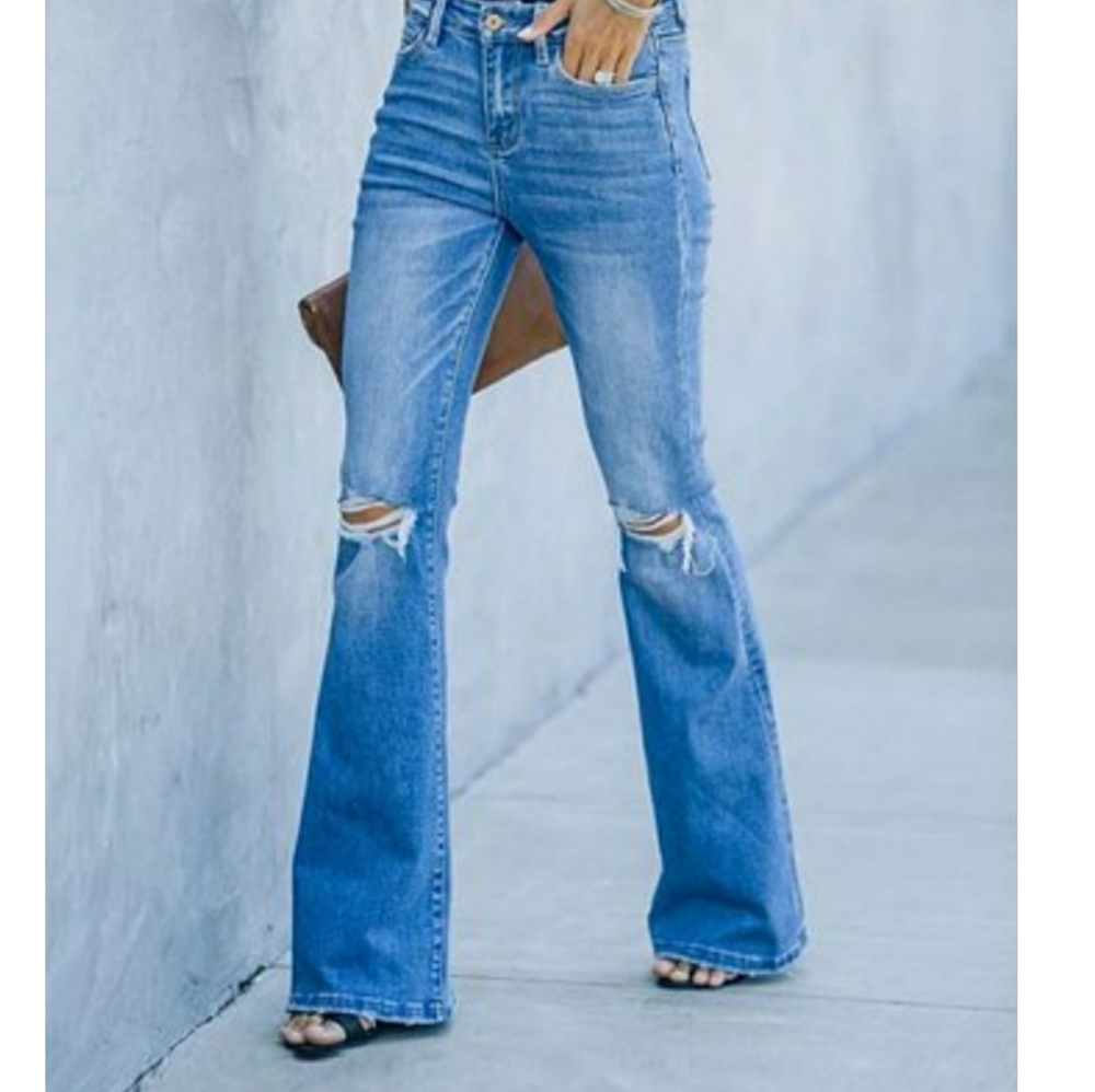 Ripped knee flare jeans